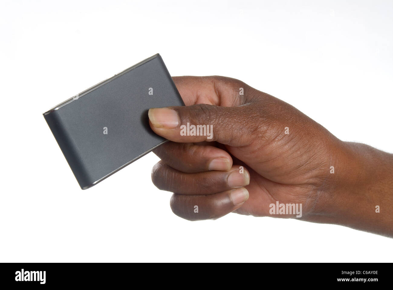 African's hand holding a blank bank card which could be used in advertising Stock Photo