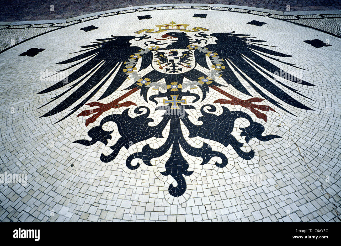 Mosaic depicting the Reichsadler (Imperial Eagle) in front of Neues Rathaus (New City Hall) at Schlossplatz in Wiesbaden. Stock Photo