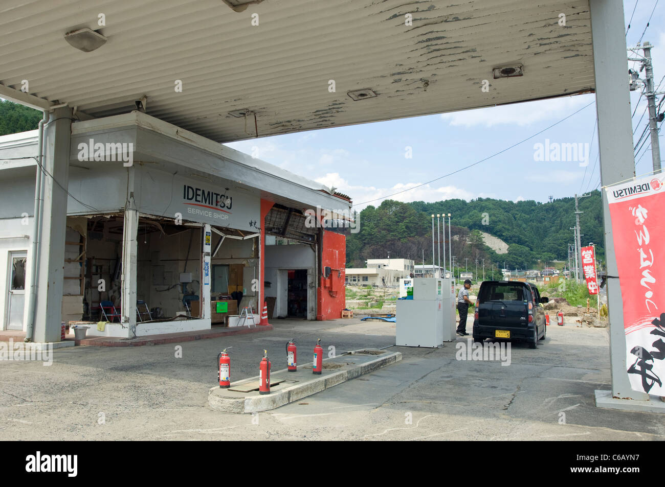 Image of a tsunami damaged but functioning gas station in the town of Taro, Iwate, Japan Stock Photo