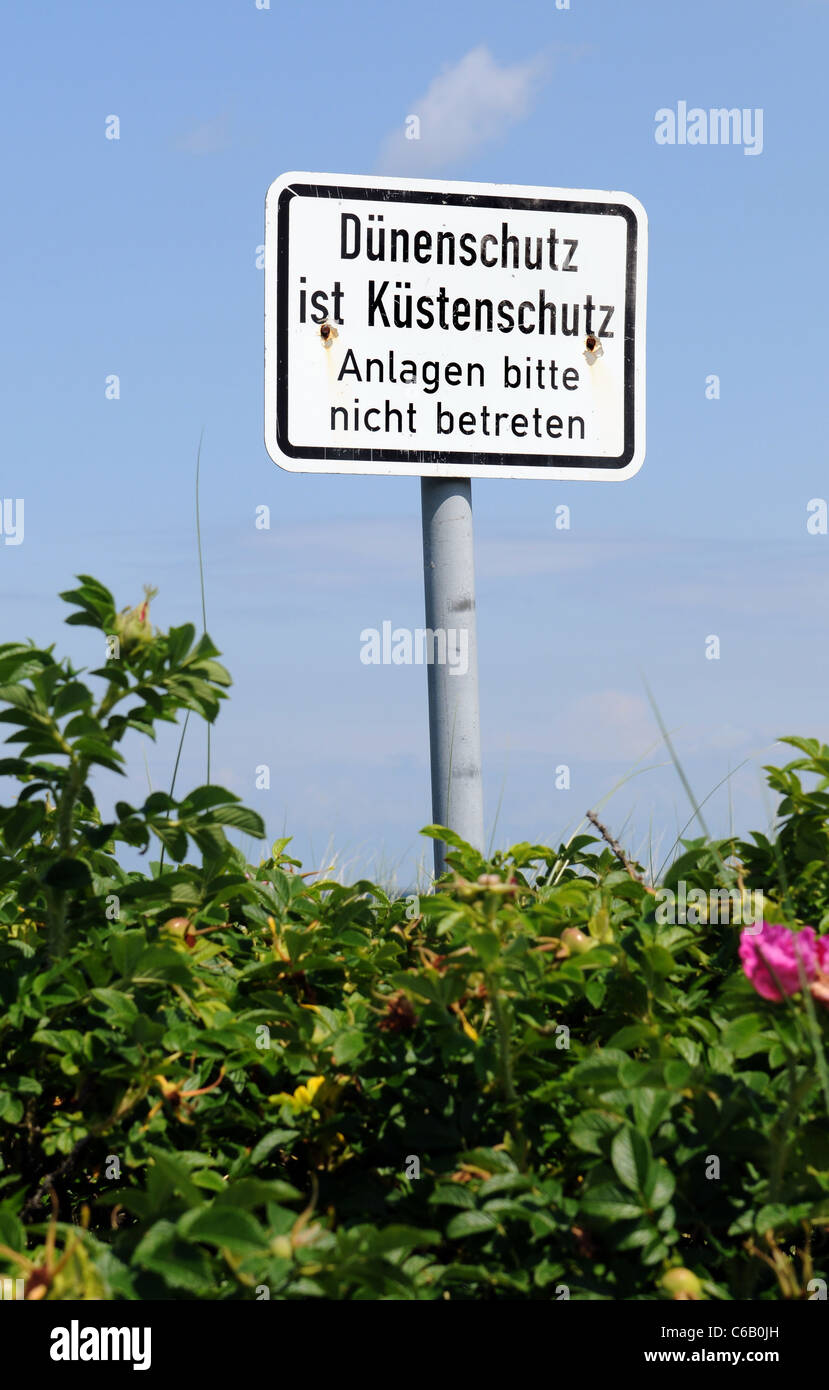 Sign for dune protection at a German beach Stock Photo