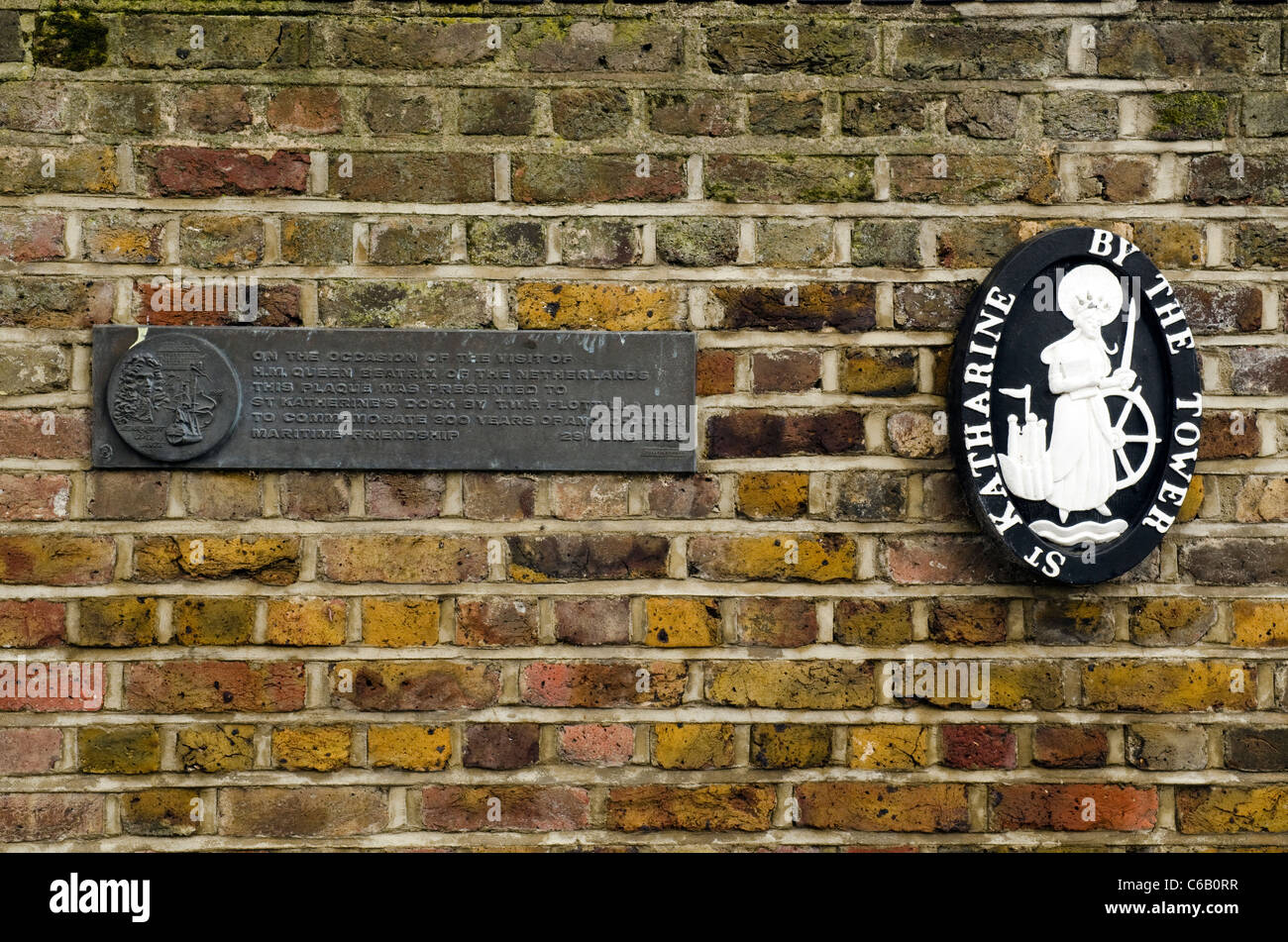 St Katharine's dock wall plaque and AngloDutch memorial tablet on a