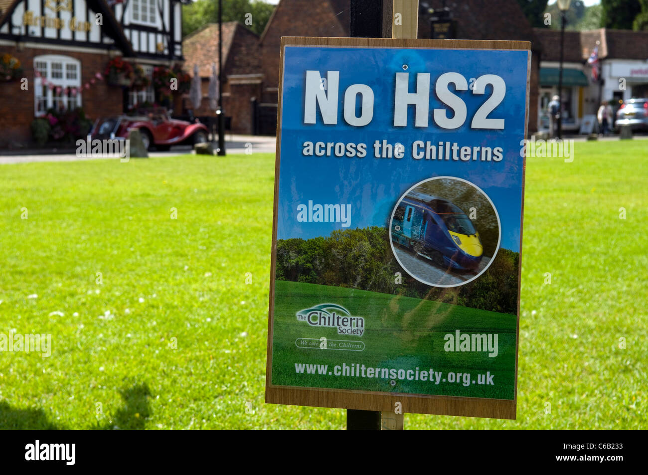 No HS2 across the Chilterns protest sign on the green at Chalfont St Giles village Bucks UK Stock Photo