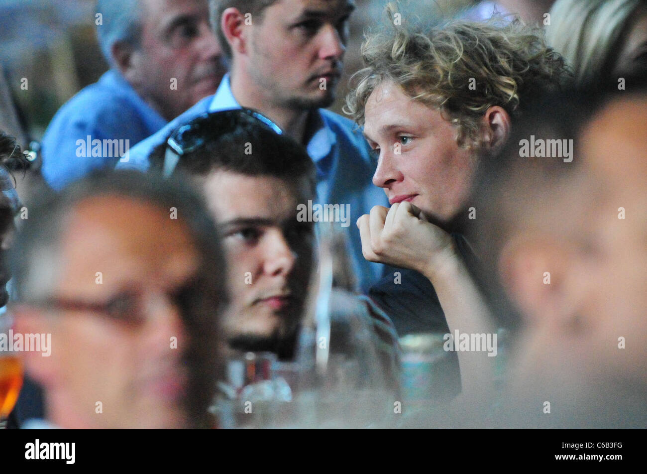 German actor Matthias Schweighoefer watching the World Cup 2010 semi finale between Germany and Spain at Cafe am neuen See Stock Photo