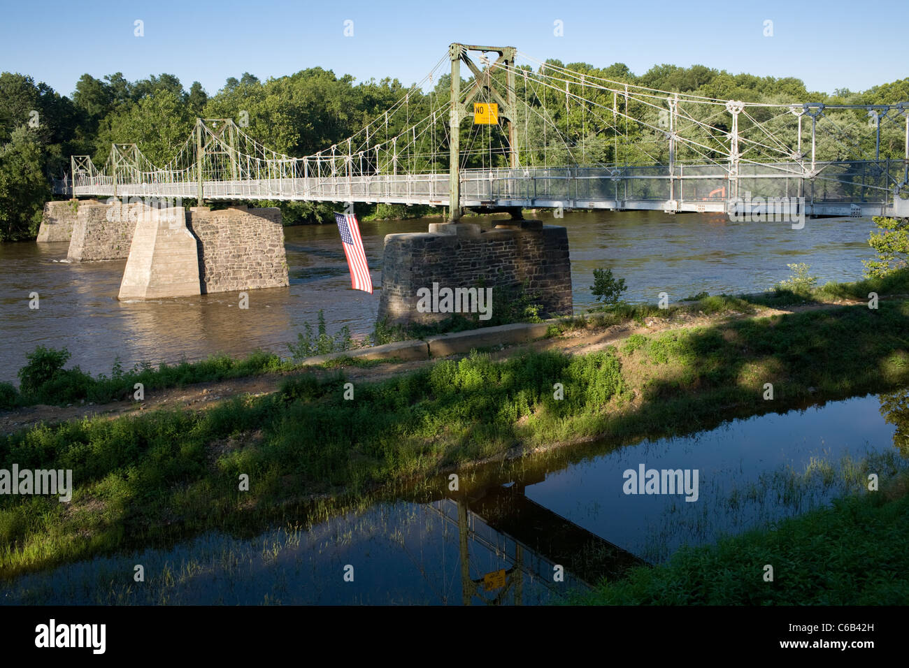 Pedestrian Bridge from Bulls Island, Raven Rock, New Jersey, across Delaware River to Pennsylvania Stock Photo