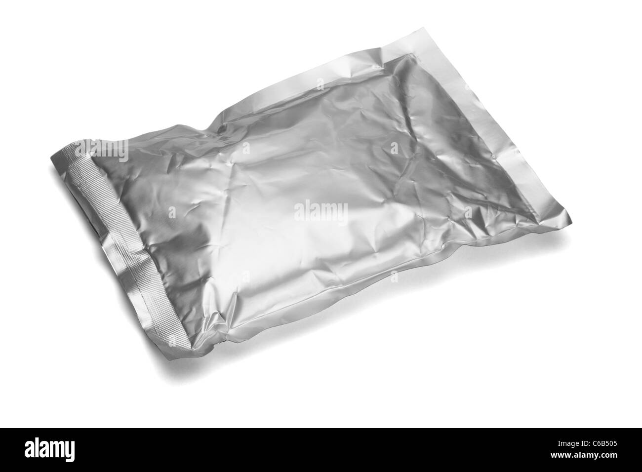 Sealed aluminum bag lying on white background Stock Photo