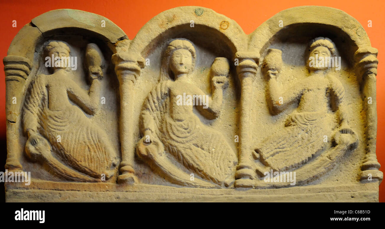 Stone relief of three water nymphs, roman artifact found near Hadrian's Wall, England. Stock Photo