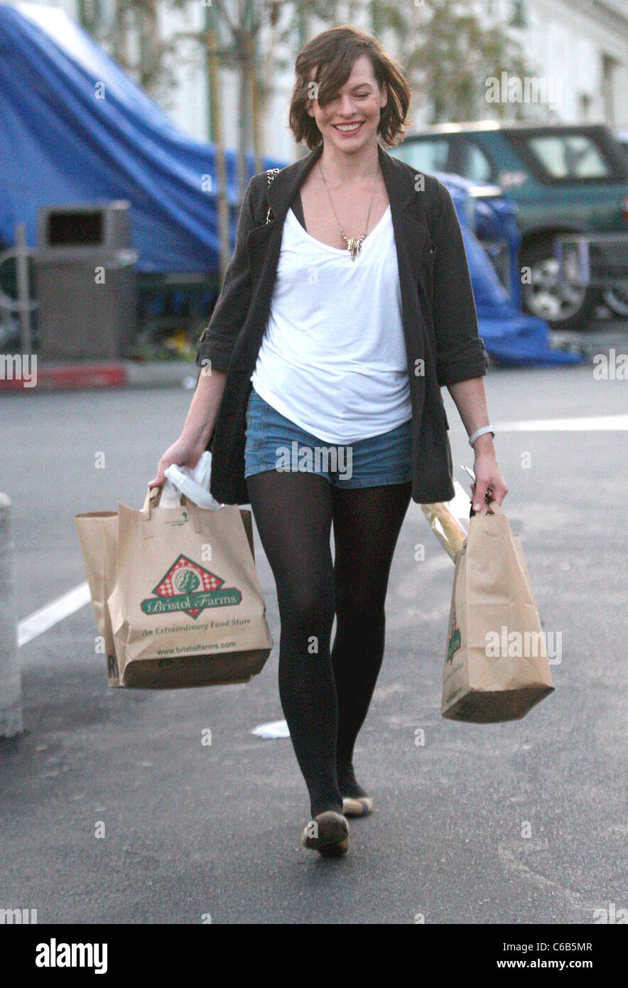 Milla Jovovich shopping at Bristol Farms in Hollywood Los Angeles