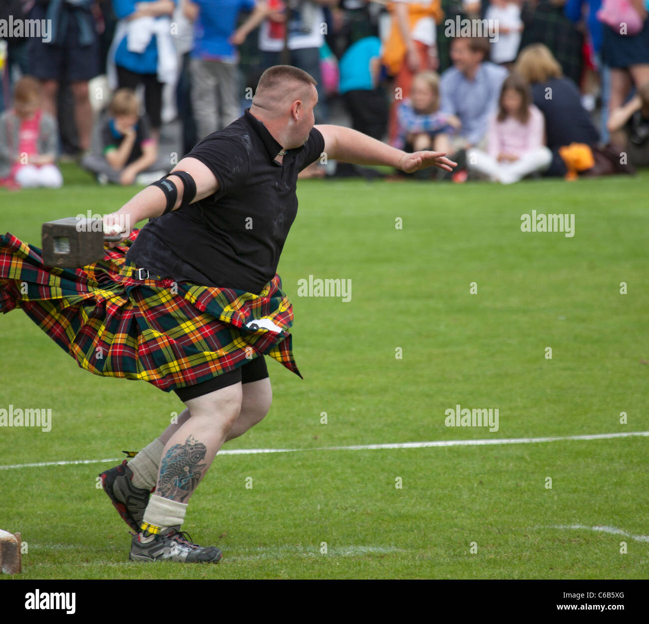 Kilted heavyweight athlete in the 'throwing a 56lb weight" competition