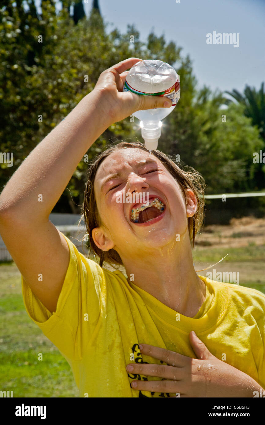 Teenage girl water bottle hi-res stock photography and images - Alamy