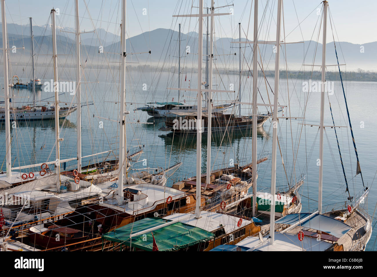 Fethiye,Harbour,PaspaturMarket,Paspatur,Stream,River,Gulets,Luxury Yachts, Sailing,Cruising Area,Snow capped Mountains,Turkey Stock Photo