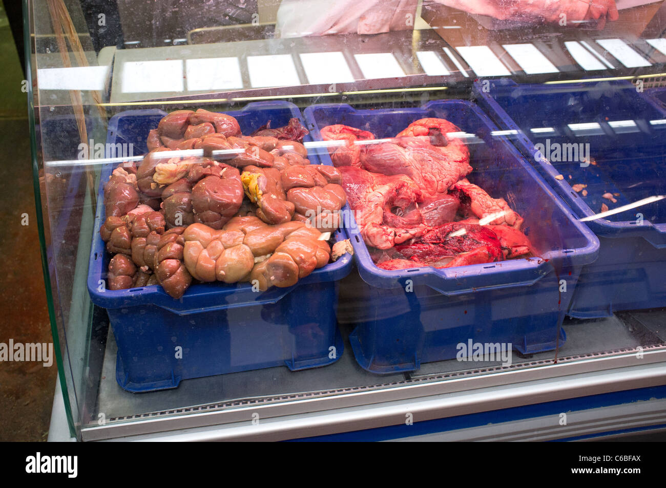 Offal in containers at Smithfields Meat Market, City of London, UK Stock Photo