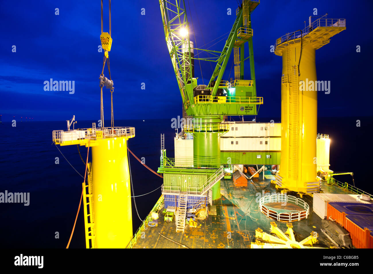 The jack up barge, The Goliath lifting a 320 tonne transition piece into place on the Walney