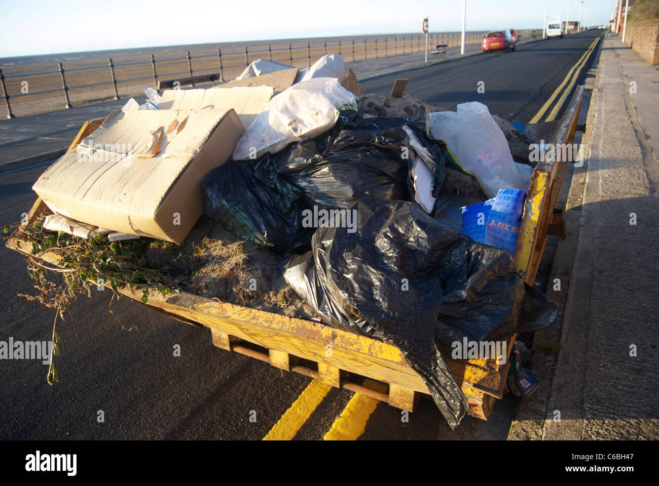 A skip on the road hires stock photography and images Alamy