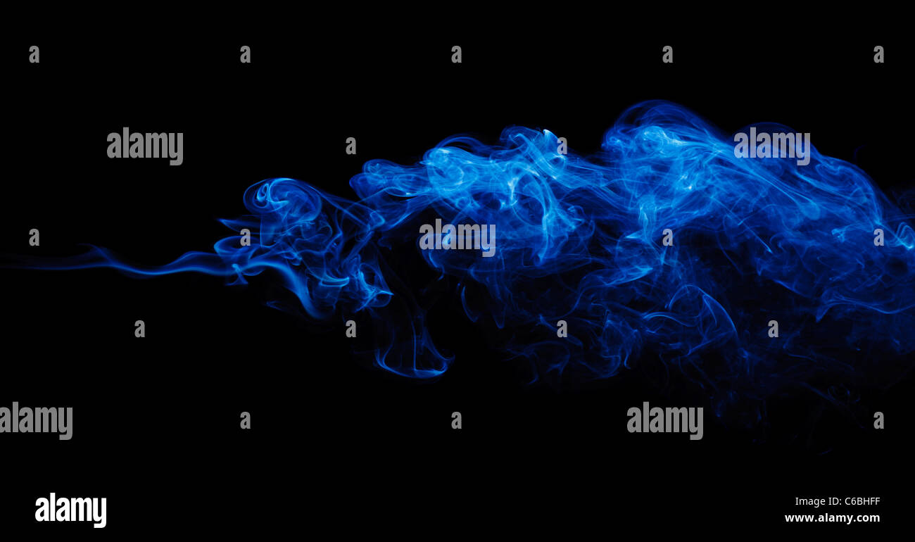 blue abstract smoke pattern on a black background Stock Photo - Alamy
