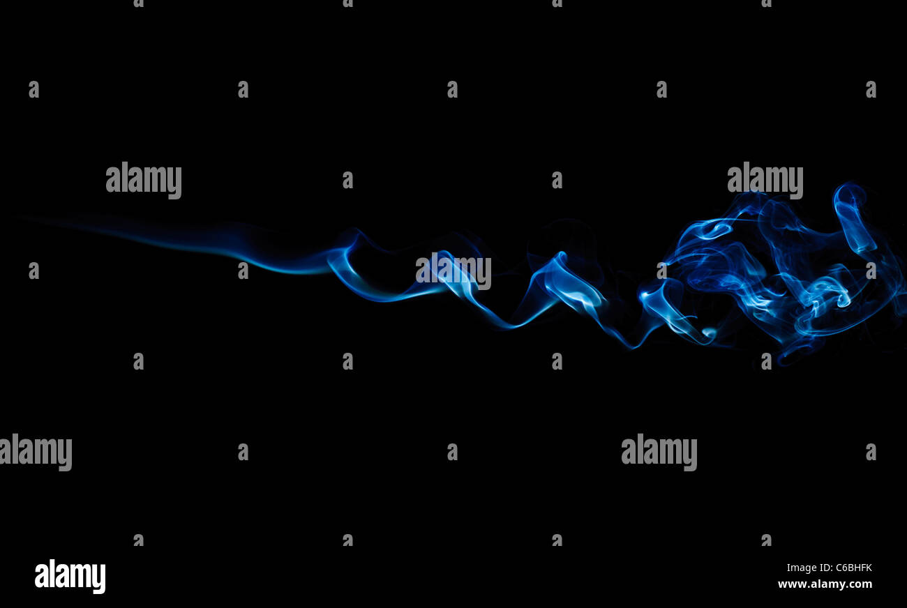 blue abstract smoke pattern on a black background Stock Photo - Alamy