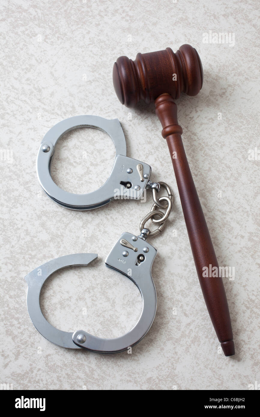 Gavel and handcuffs Stock Photo