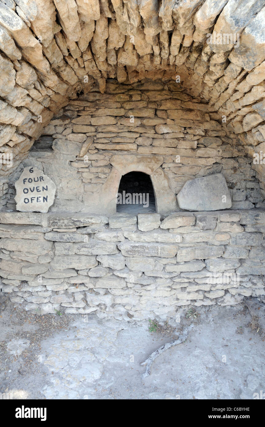 Ancient oven in hut made from stones in The Bories Village, near Gordes in Provence region, France Stock Photo