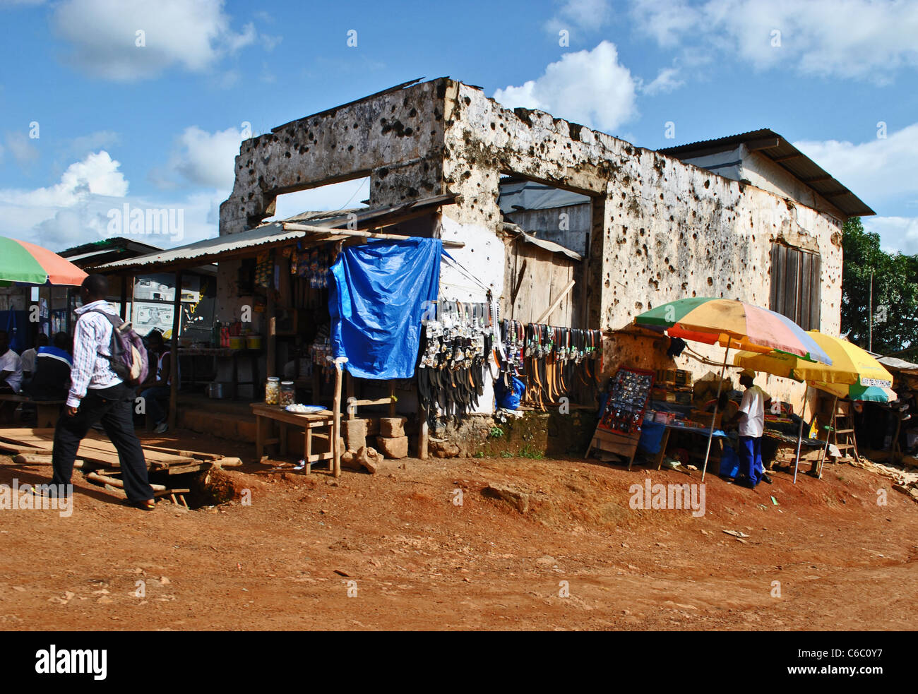 Bullet holes in house, Zorzor, Liberia Stock Photo