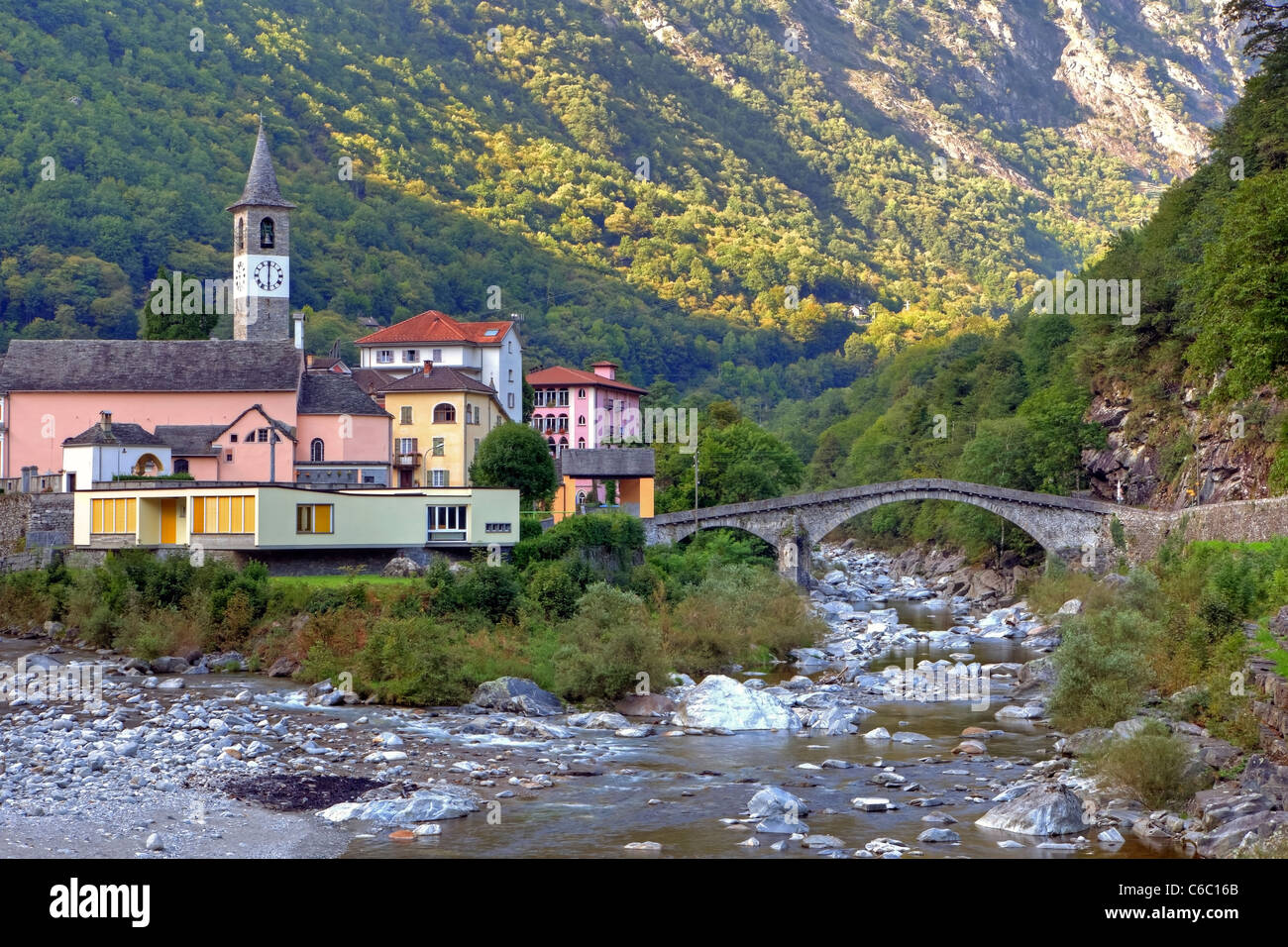 The village Bignasco in the Valle Maggia, Ticino with its famous stone bridge Stock Photo