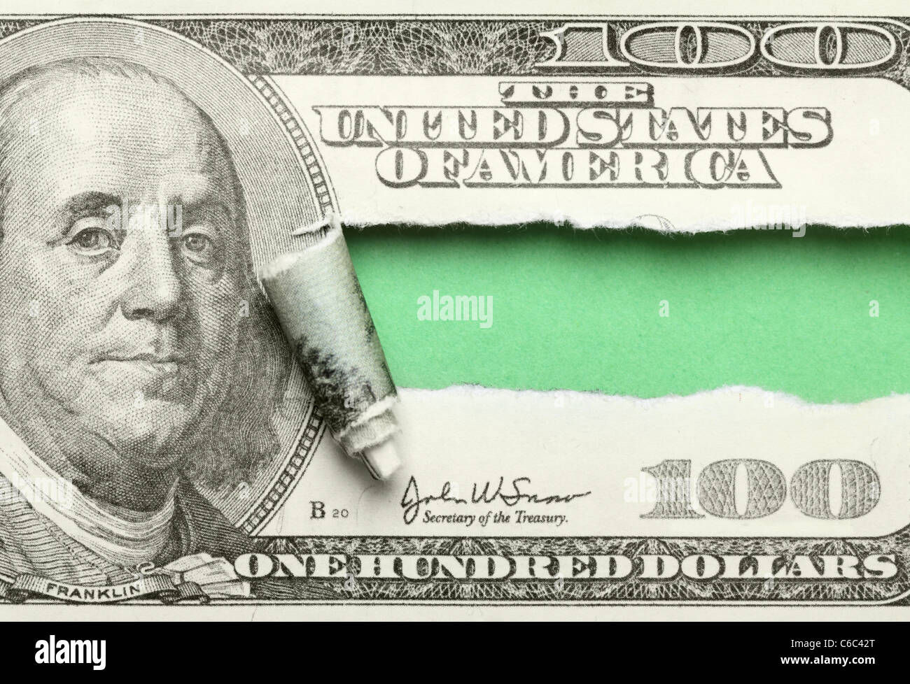 Torn hundred dollar bill with space for your own text Stock Photo