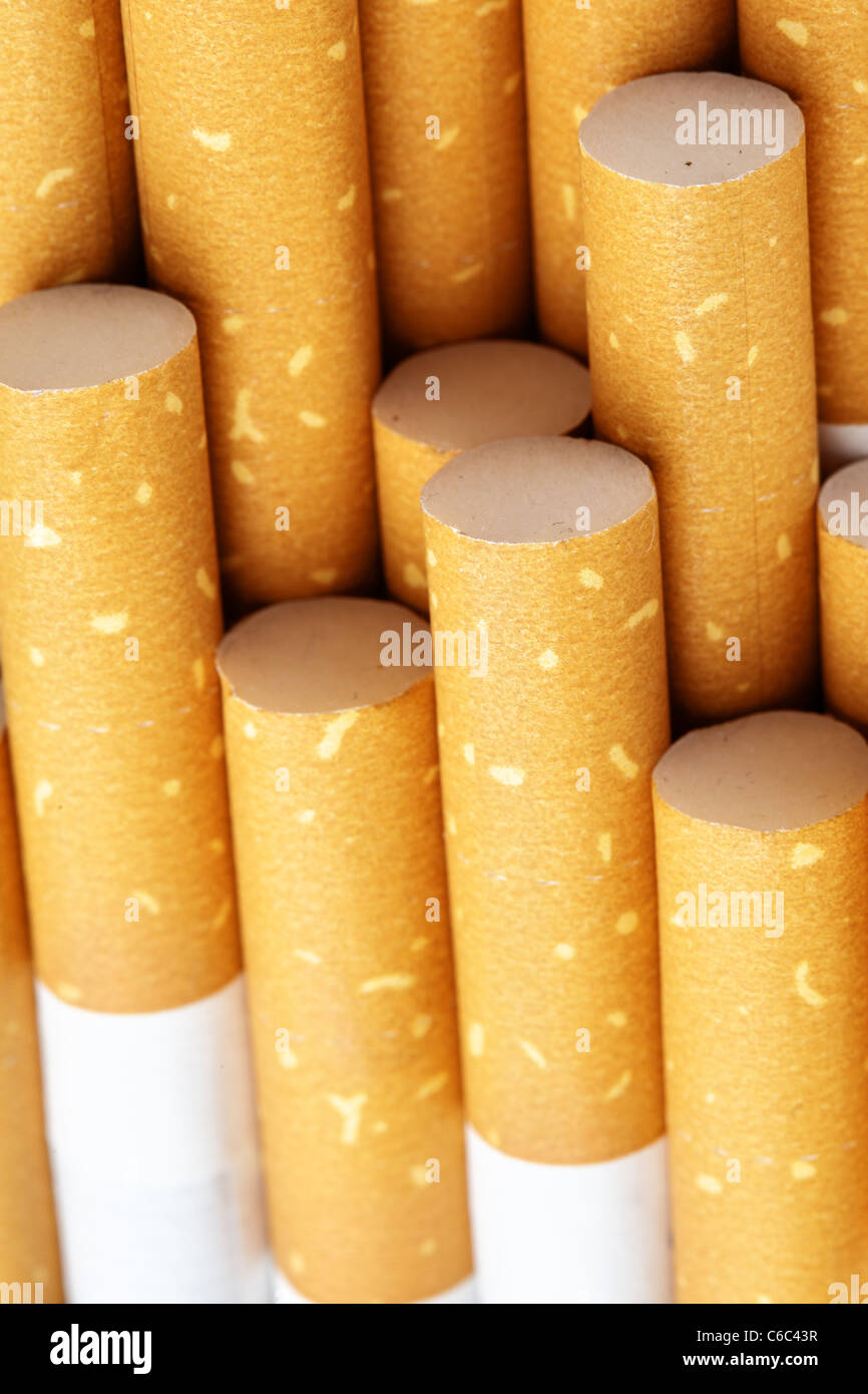 Yellow cigarette filters closeup Stock Photo Alamy