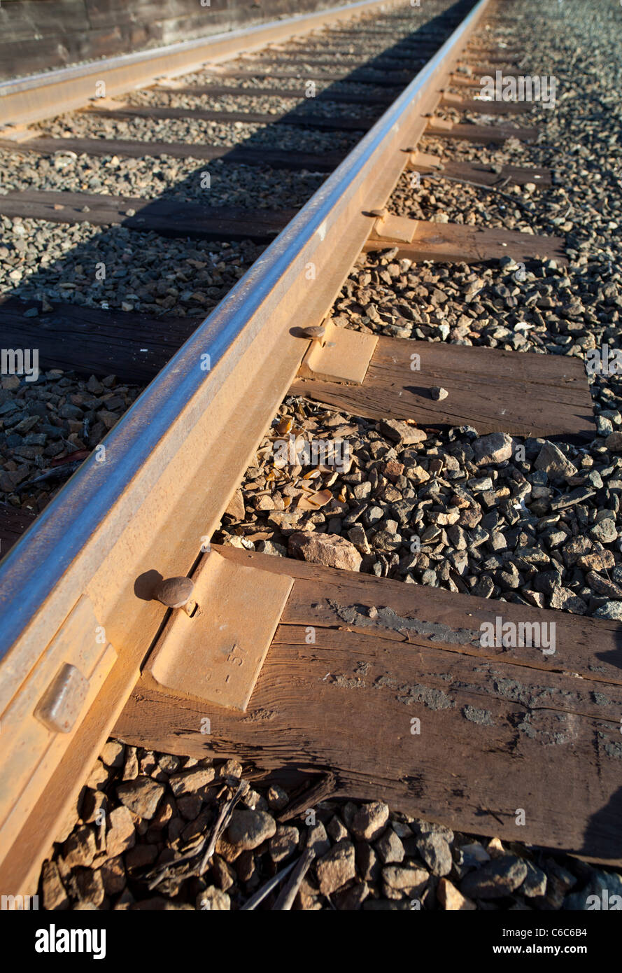 Wooden railroad sleepers , rails nailed to them with iron spikes  , Finland Stock Photo