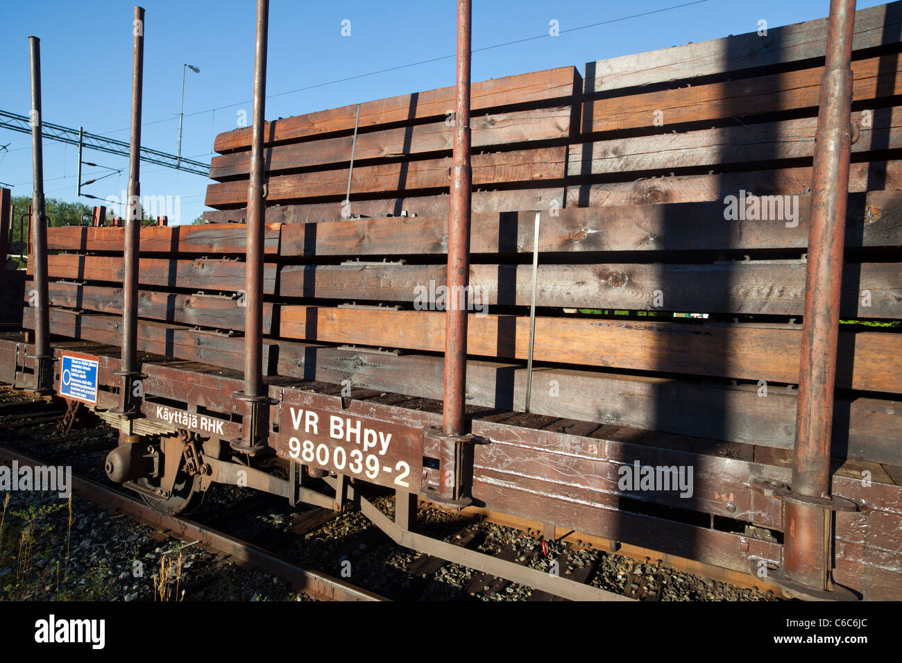 Trainload of brand new wooden railroad sleepers , Finland Stock Photo