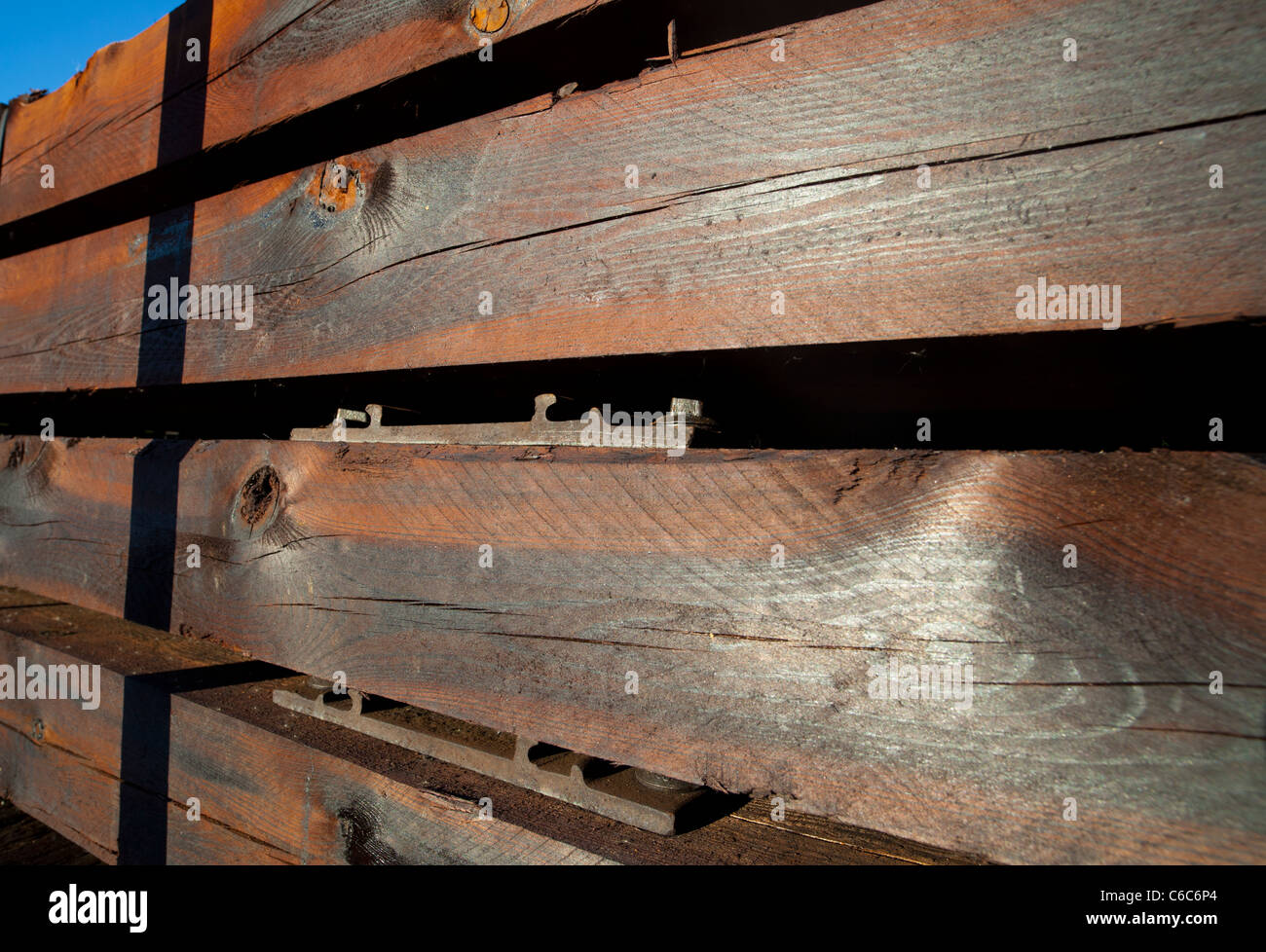 Brand new square timber beams used as railroad sleepers , Finland Stock Photo