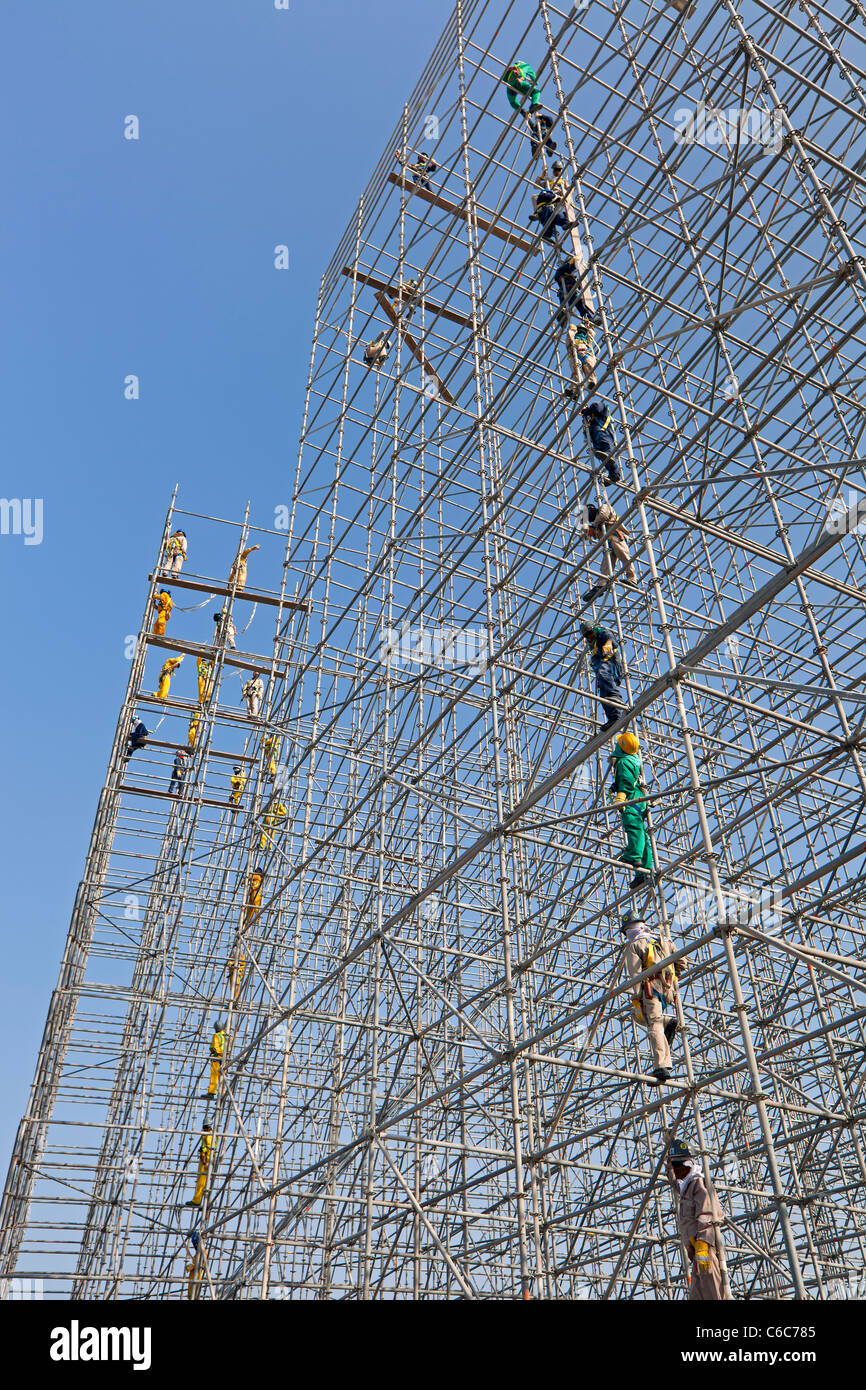 Qatar, Middle East, Arabian Peninsula, Doha, Scaffolding construction being erected in Central Doha Stock Photo
