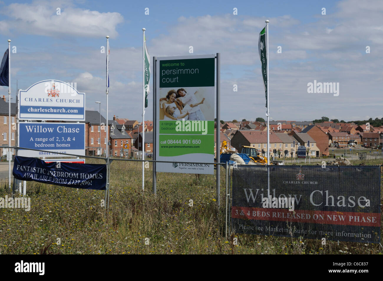 Housing development buildboards near newbuild housing estates at