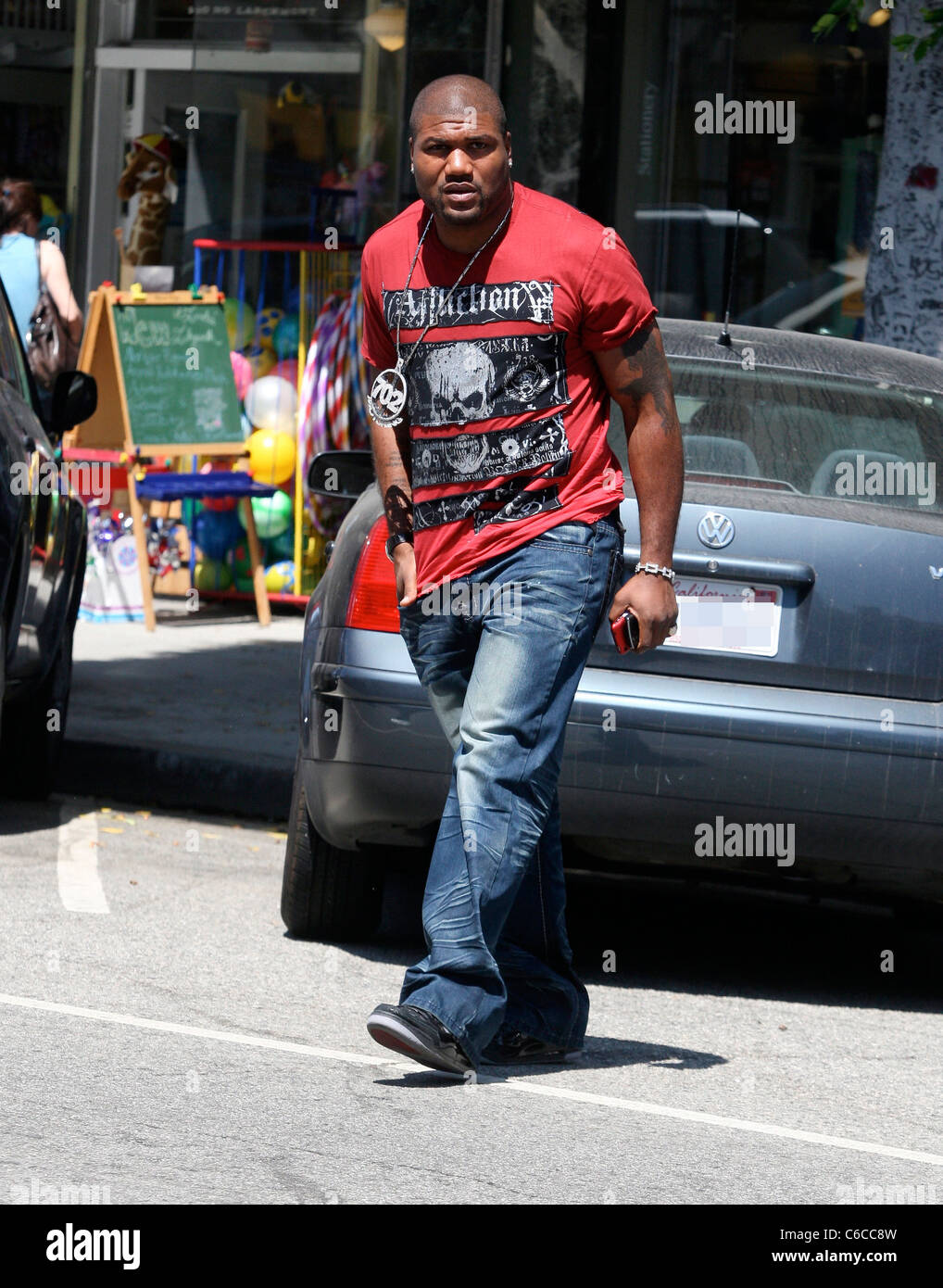 Quinton Jackson aka Rampage Jackson leaves Coffee Bean with a friend in