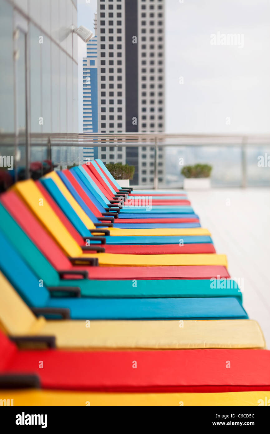 UAE, Dubai, abstract selective focus row of colourful hotel chairs Stock Photo