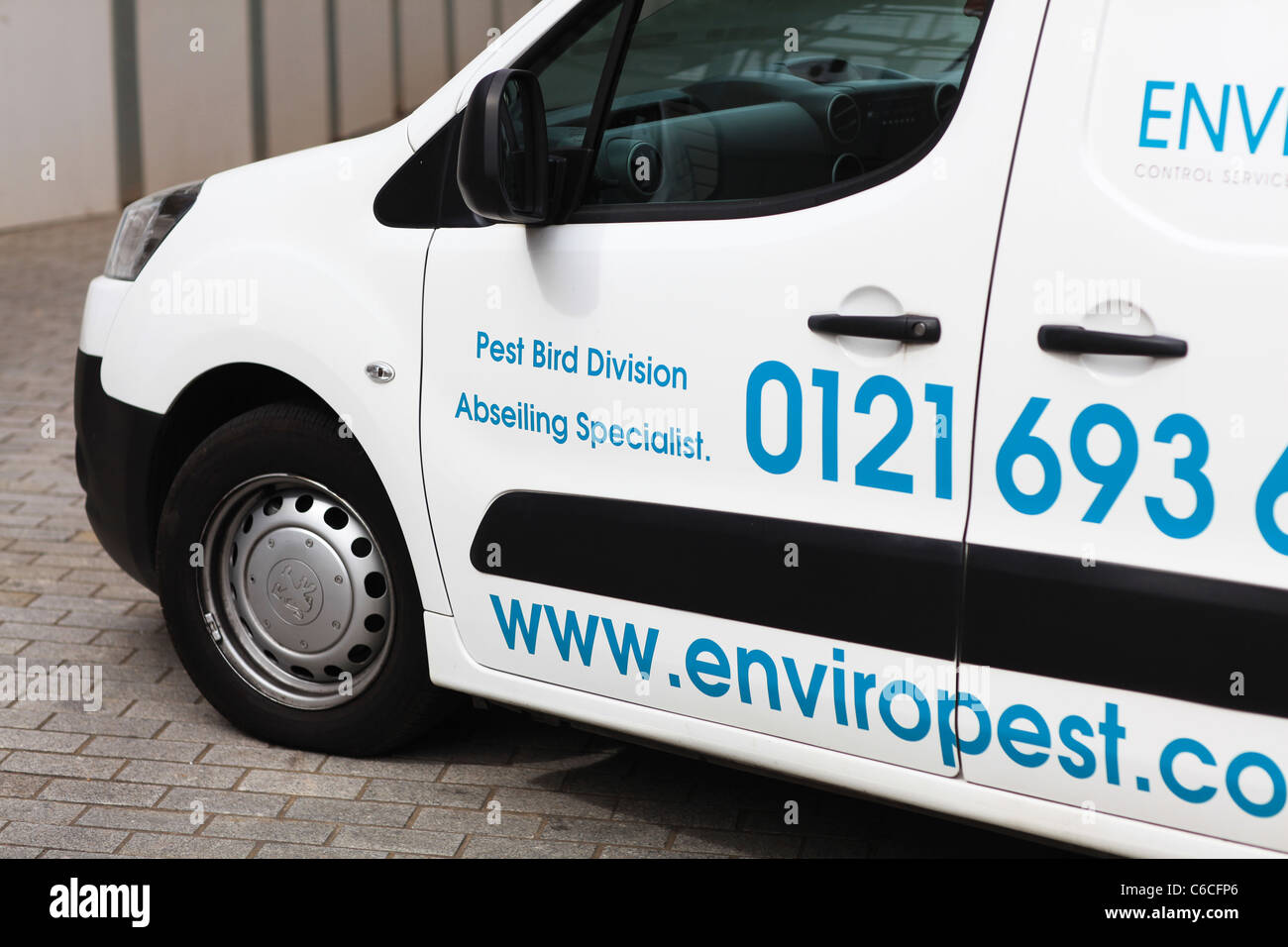 bird pest control vehicle,abseiling specialist Stock Photo