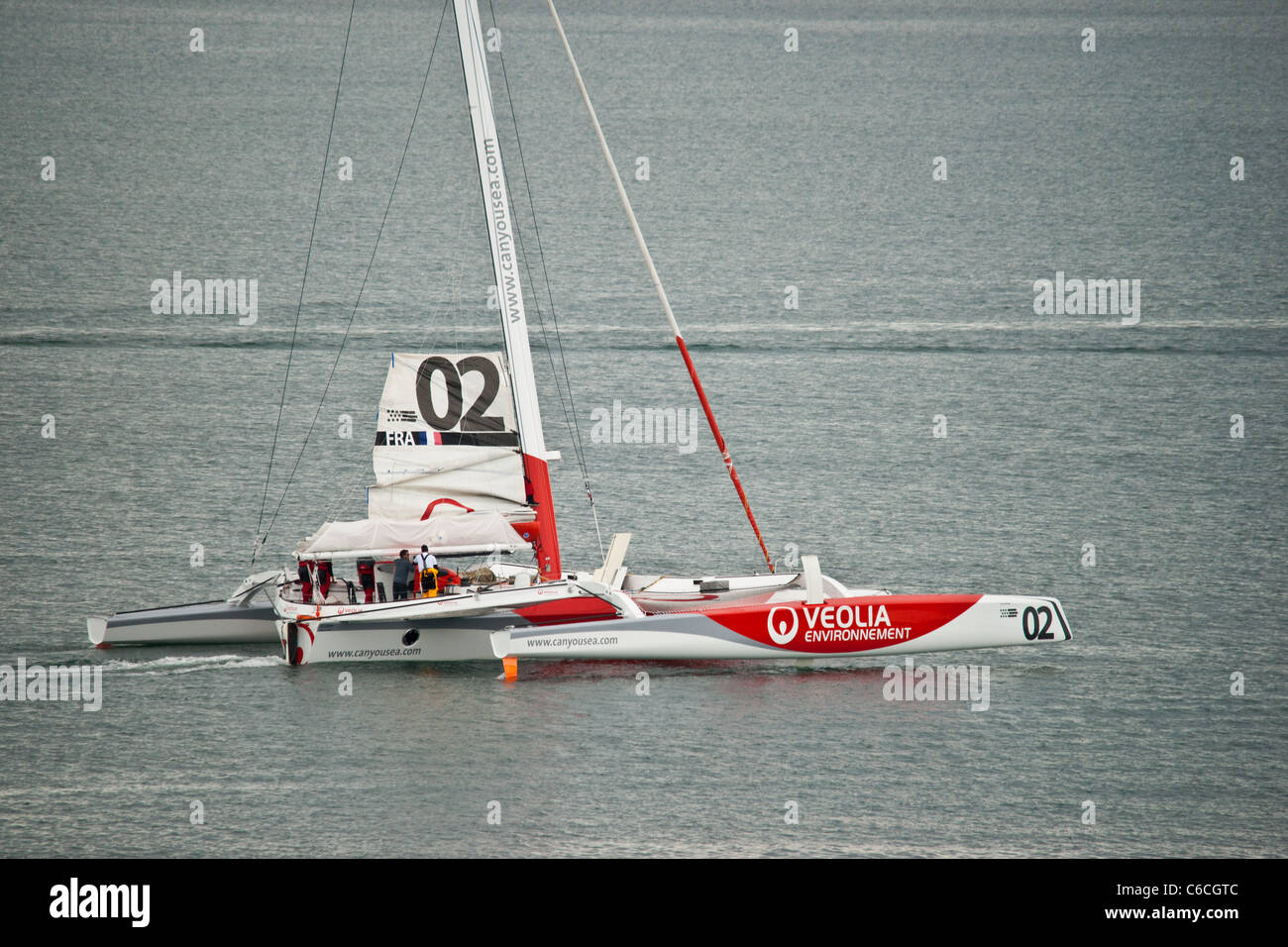 Fastnet yacht leaving Plymouth Sound after winning the race. Stock Photo