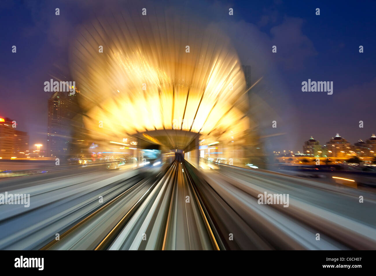 Opened in 2010, the Dubai Metro, MRT, in motion approaching a station, Dubai, United Arab Emirates Stock Photo