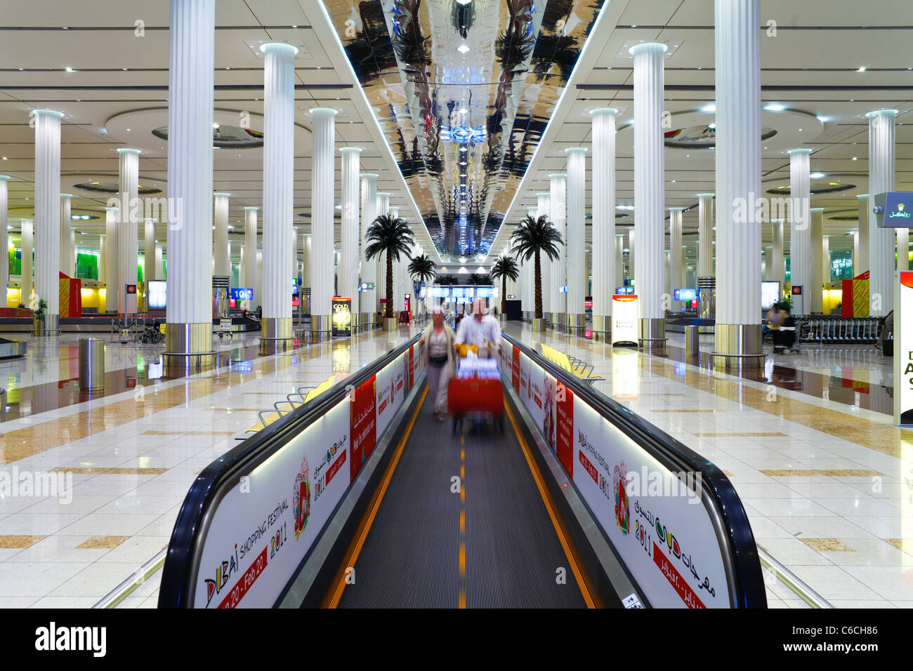 Walkway in the stylish 2010 opened Terminal 3 of Dubai International Airport, Dubai, UAE, United Arab Emirates Stock Photo