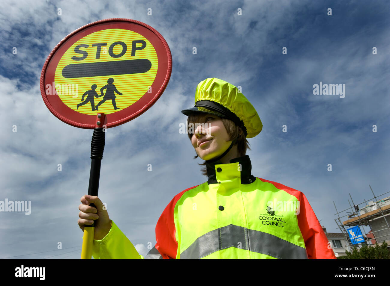 Cornwall's youngest lollipop lady in 2011, 18 year old Tomasina on school crossing patrol. Stock Photo