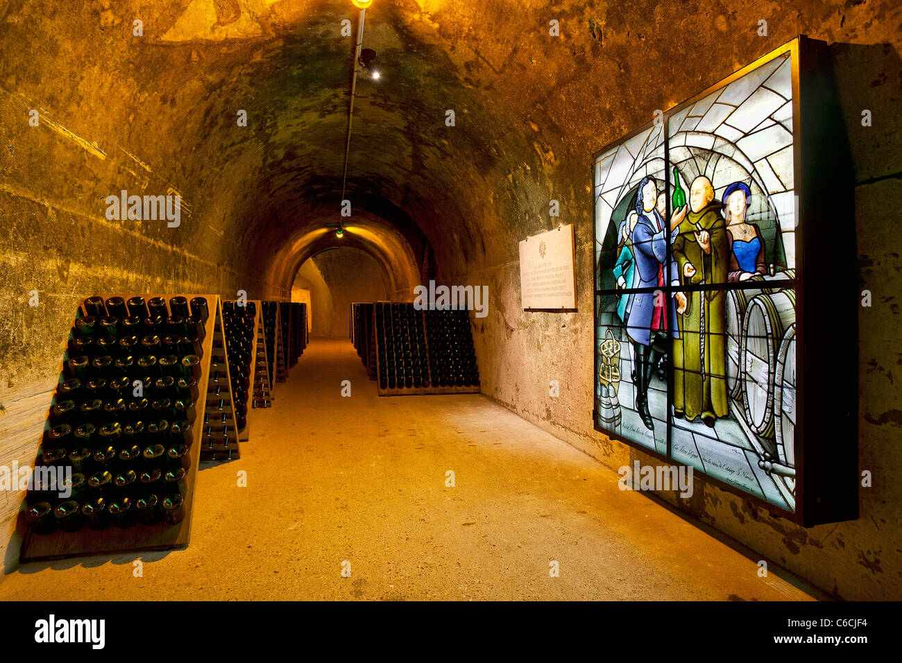 Champagne bottles in pupitre, Taittinger champagne cellar, France Stock Photo