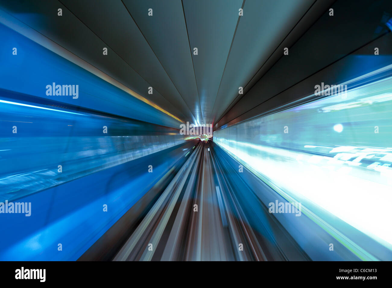 Opened in 2010, the Dubai Metro, MRT, in motion approaching a station, Dubai, United Arab Emirates Stock Photo