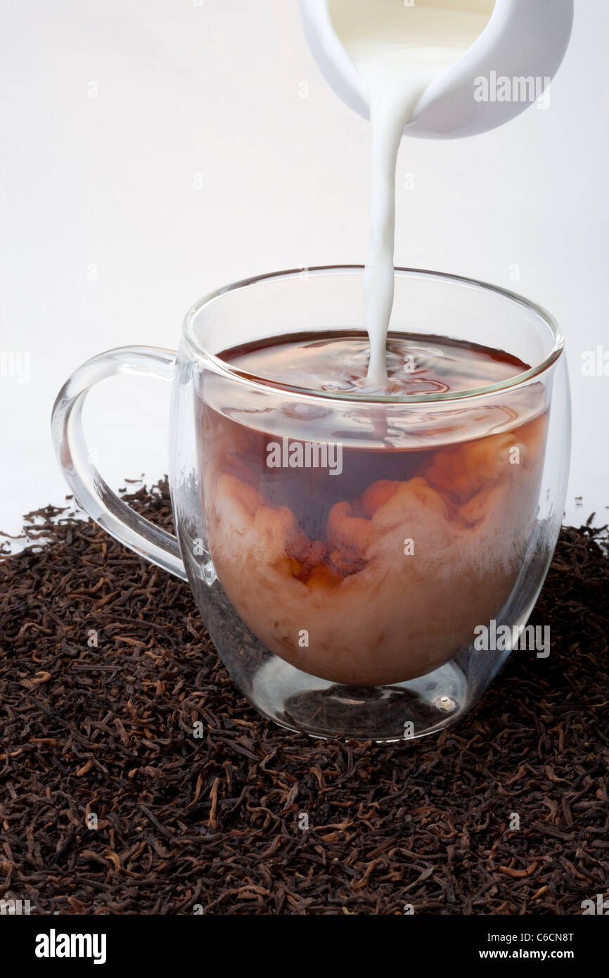Black tea and milk Stock Photo Alamy