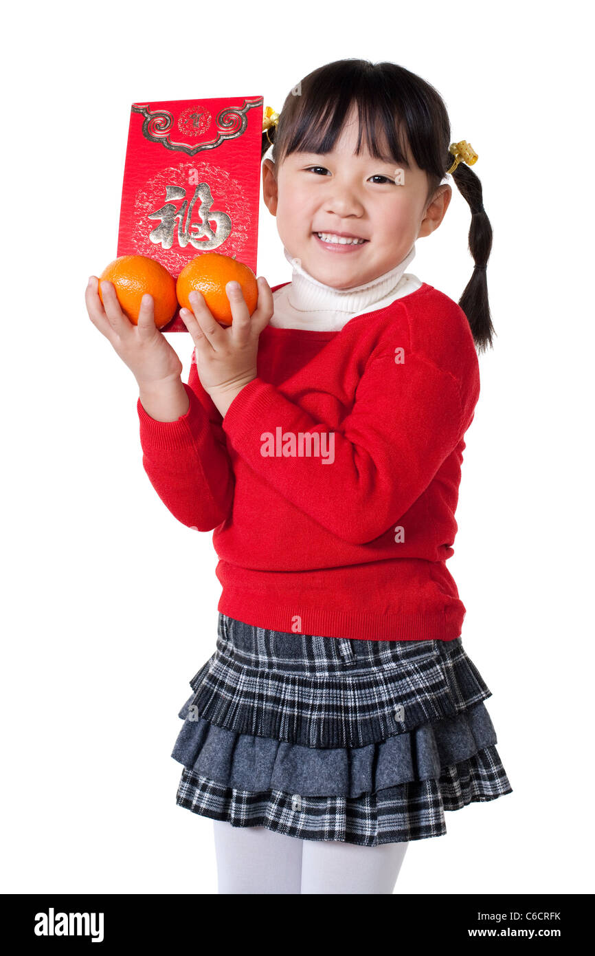 Chinese girl holding red envelope Stock Photo