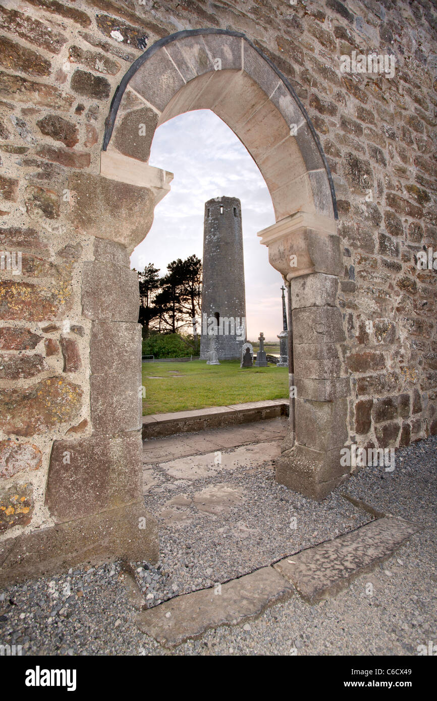 Round Tower seen through door of Clonmacnoise Abbey, Co Offaly, Ireland. Stock Photo