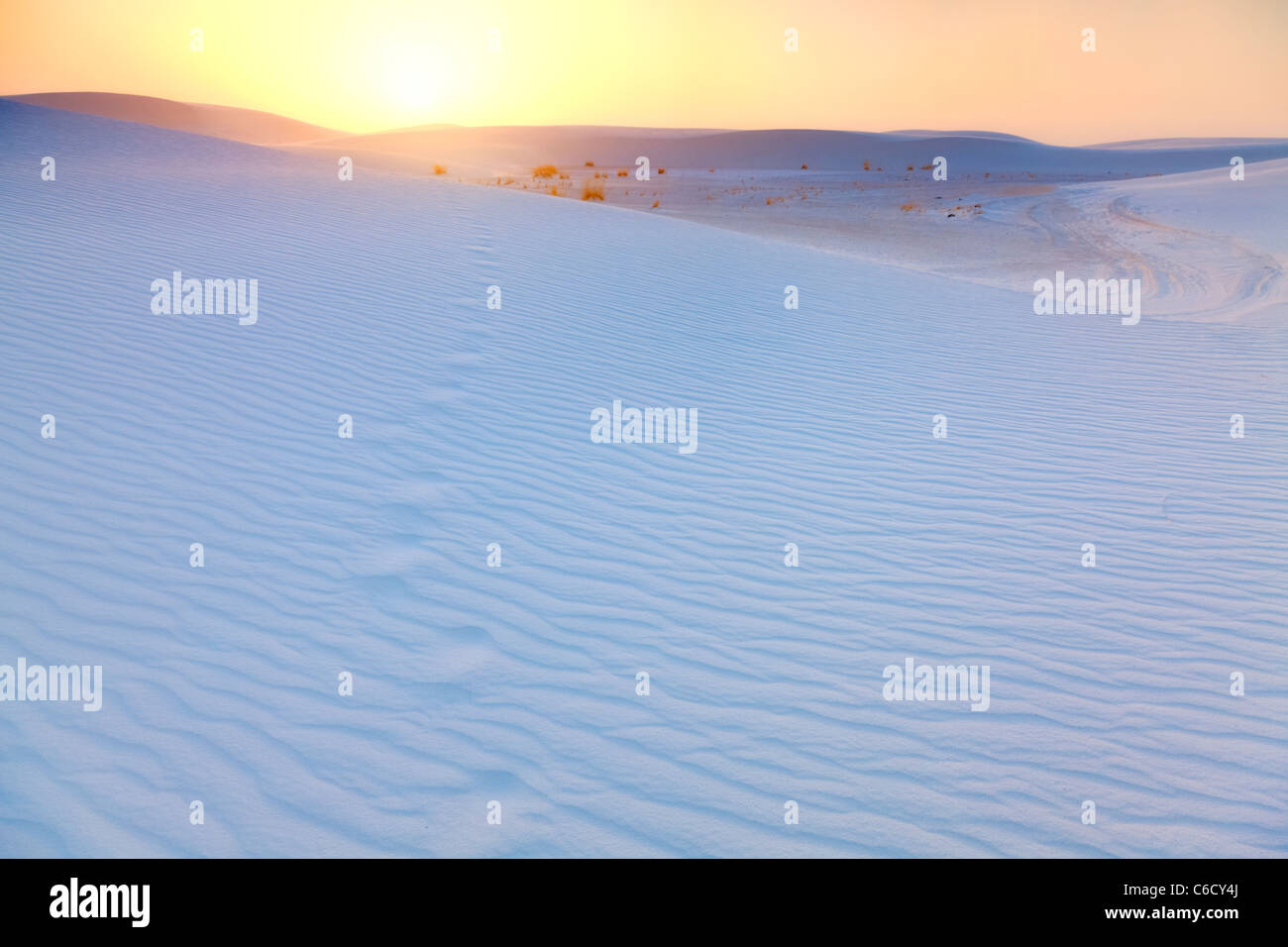 White sand dunes at sunset Stock Photo