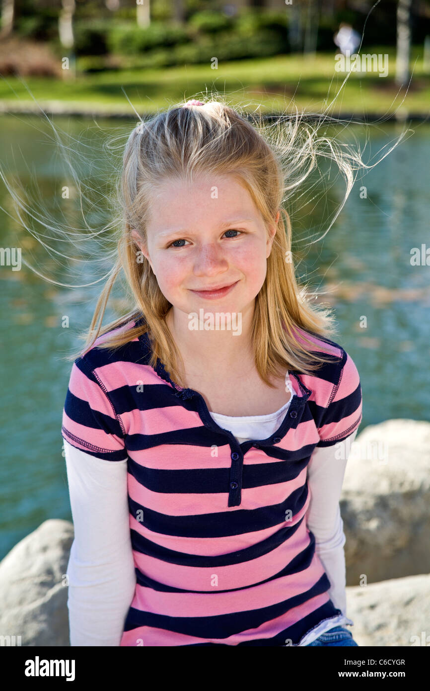 young Blonde girl 7-9 year old girl in park. MR © Myrleen Pearson Stock Photo