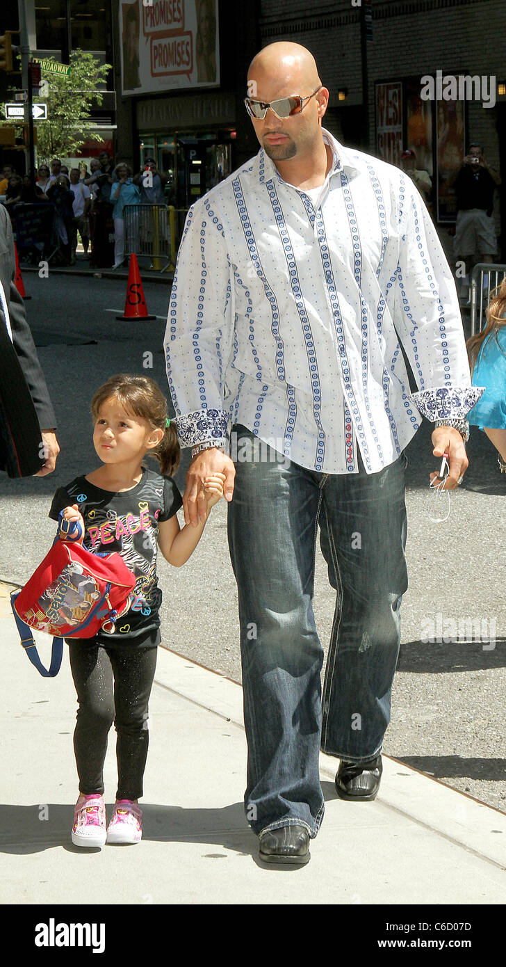 Major League Baseball player Albert Pujols and his daughter arrive