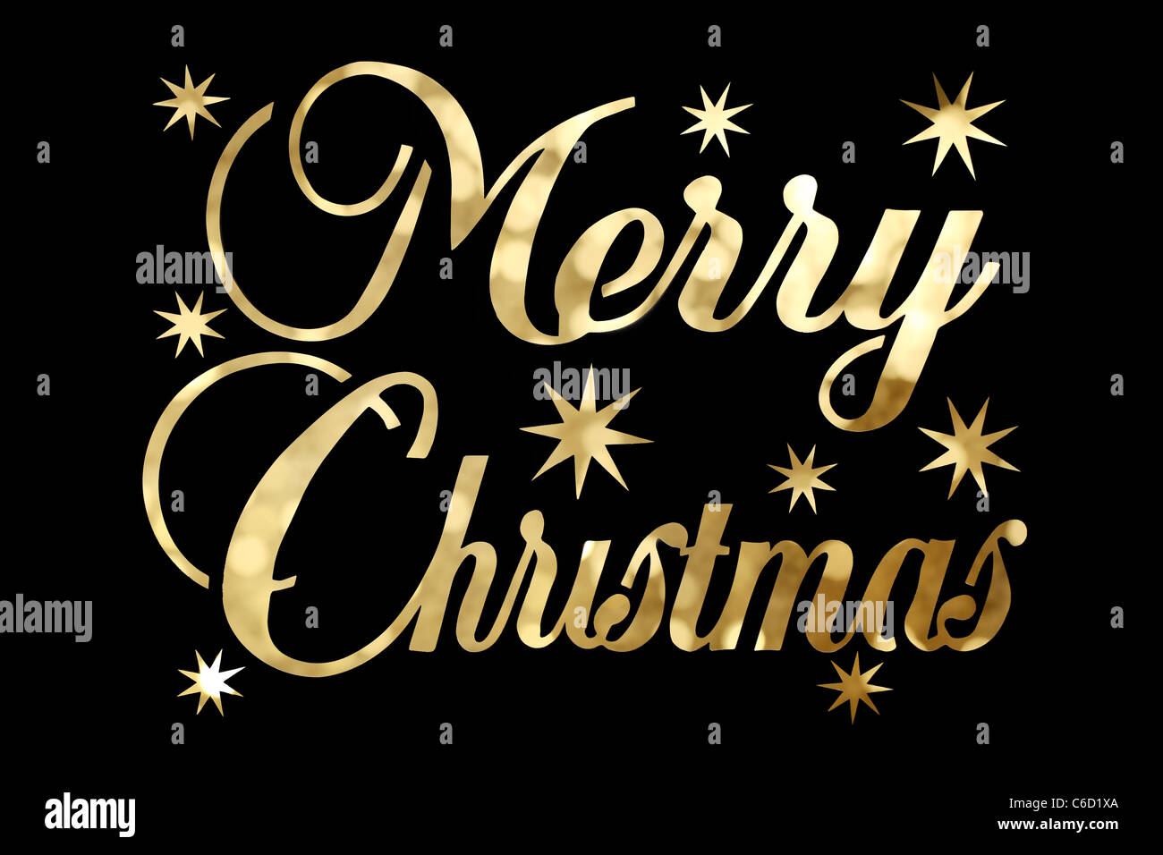 Golden Merry Christmas character isolated on black background. Stock Photo