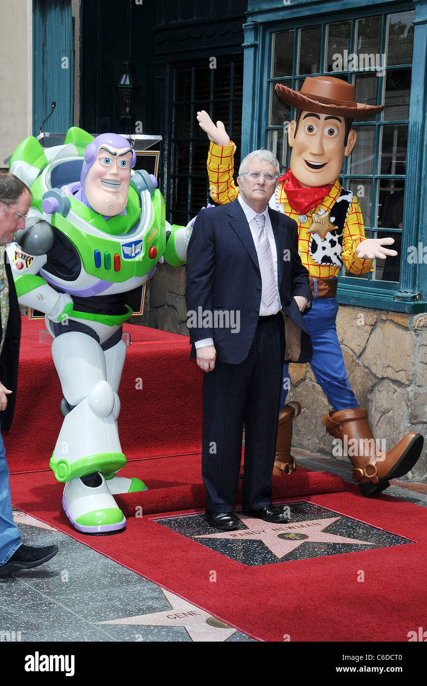 Randy Newman with Buzz Lightyear and Woody of 'Toy Story' Singer and composer Randy Newman is honoured with the 2411th star on Stock Photo