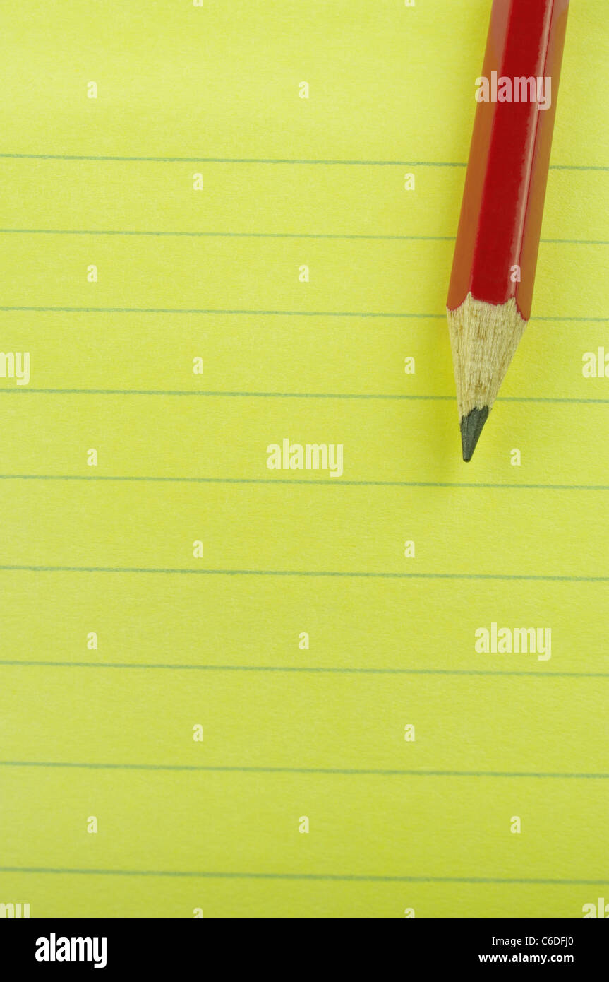 lined paper and red pencil Stock Photo Alamy