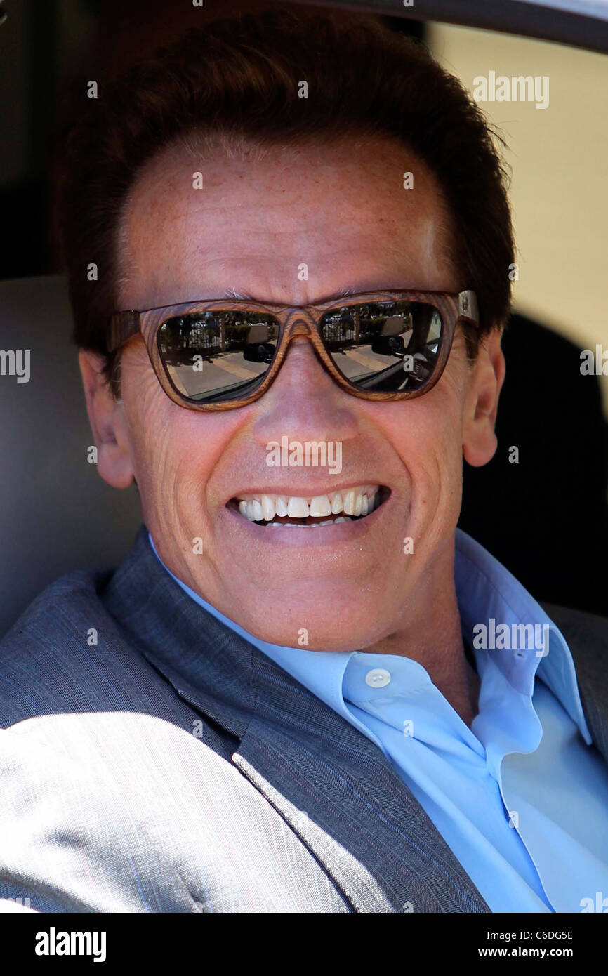 Arnold Schwarzenegger seen leaving Barney's of New York with a group of  friends and family wearing sunglasses made of wooden Stock Photo - Alamy