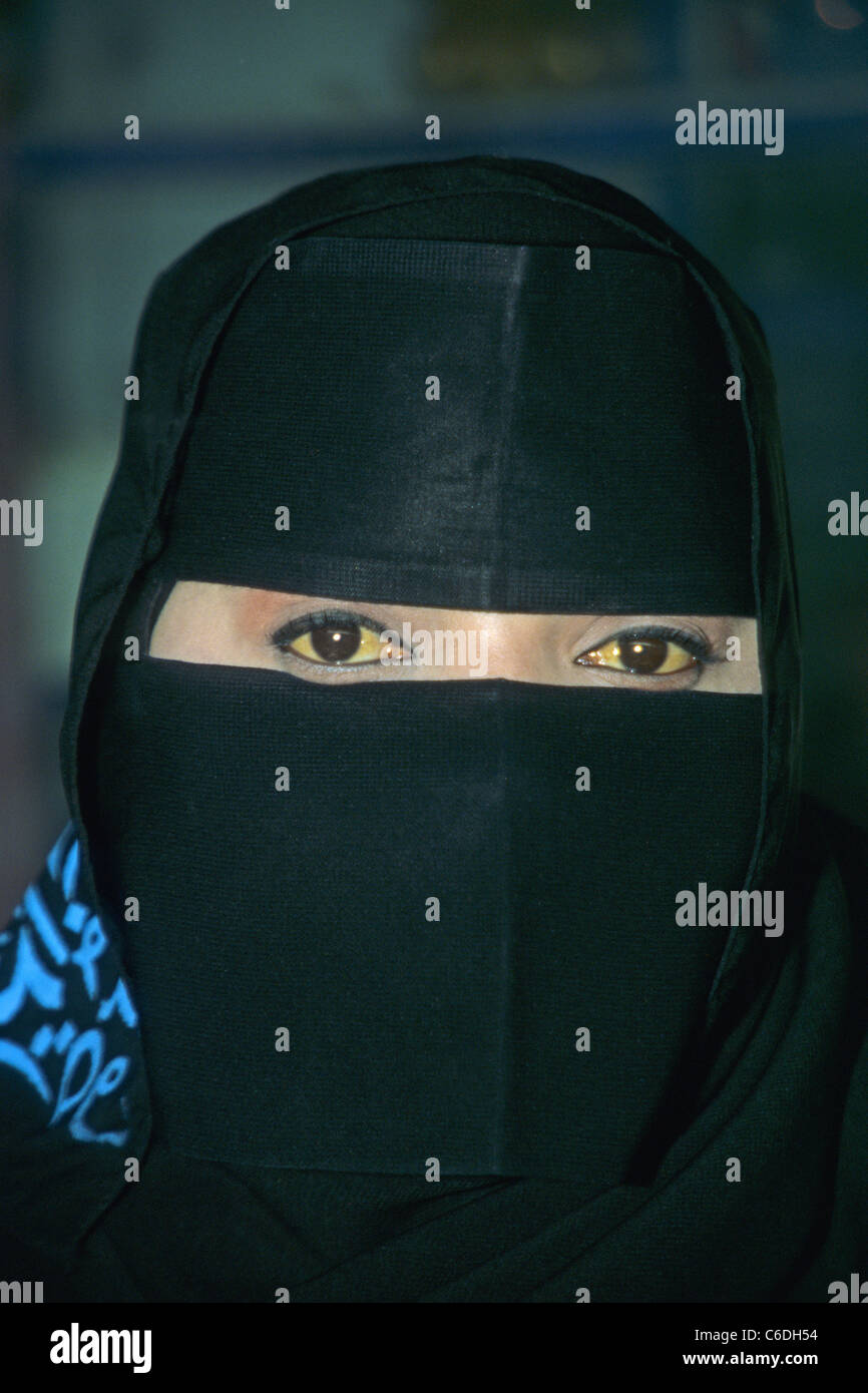 Veiled woman at Frankincense souk, Salalah, Oman, Sultanate of Oman Stock Photo